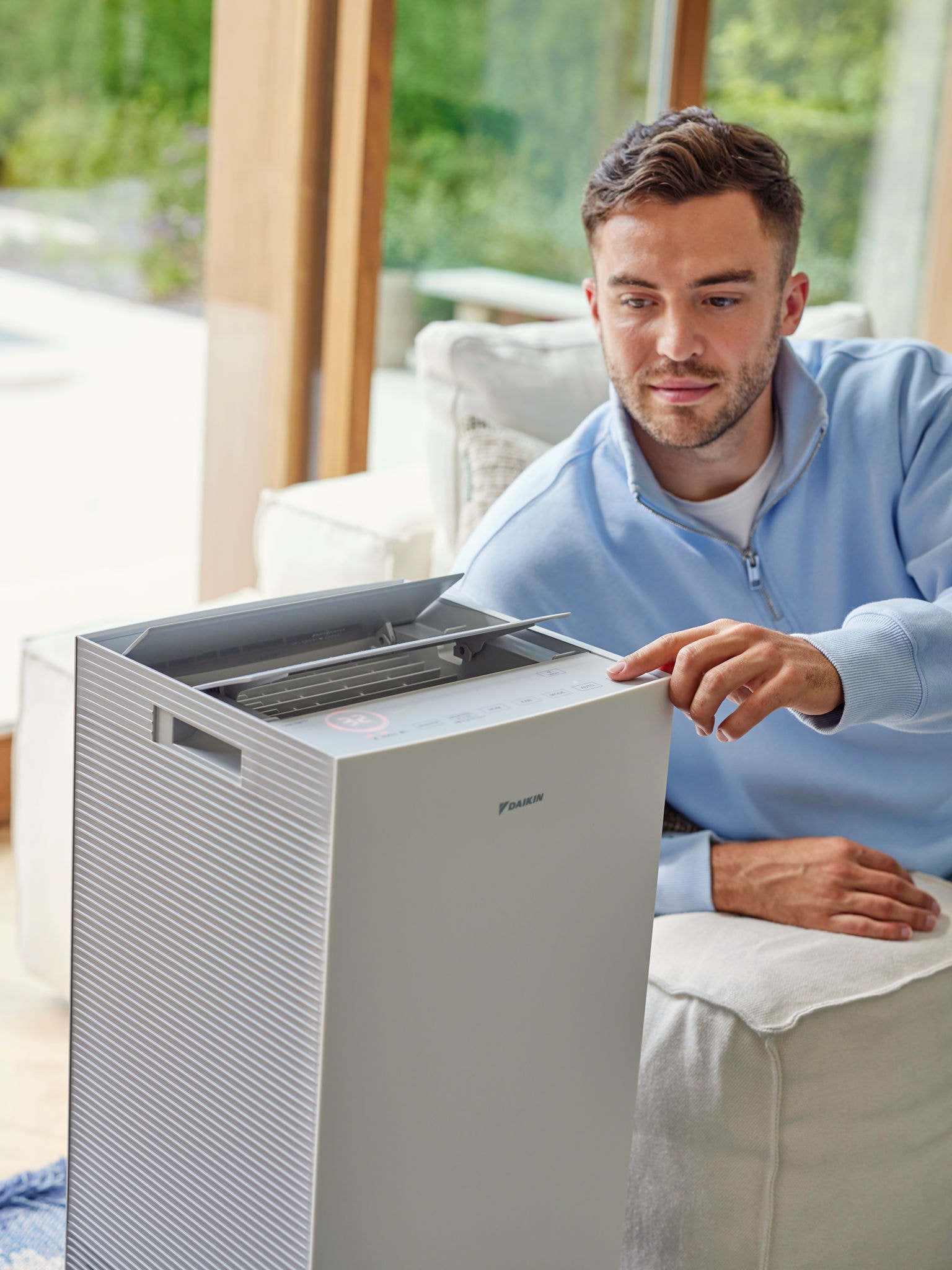 Child and pet enjoying clean air free from pet hair, dander and odours